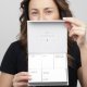 Model holding the Lash Lift Kit box open